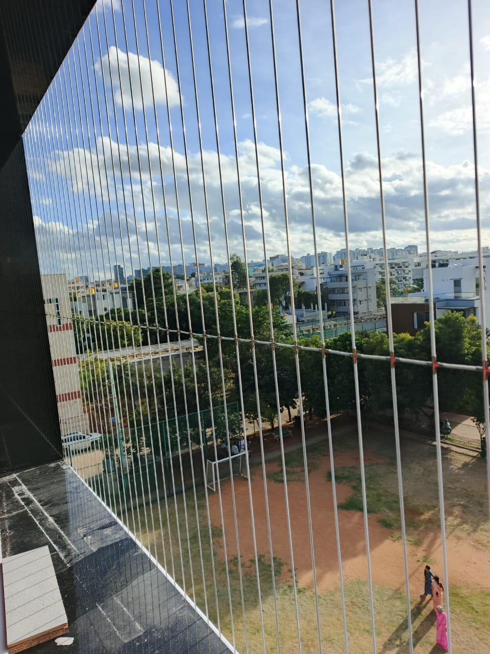 Apartment building invisible grill project